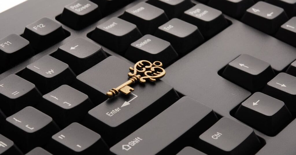 Brass Ornate Vintage Key on Black Computer Keyboard